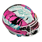 Colorful Miami Dolphins football helmet with artistic design and text on a white background